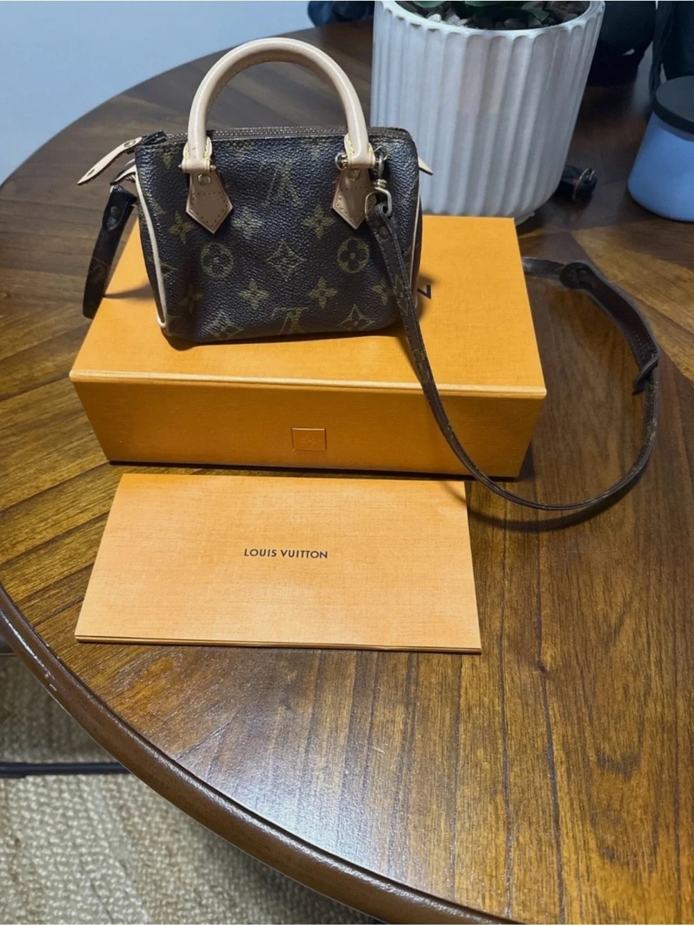 Louis Vuitton Monogram Mini Speedy Bandoulière in Brown with Natural Vachetta